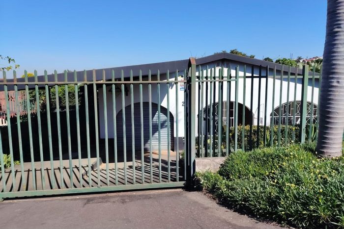 For Sale: Versatile 4-bedroom house in Newholme with security and income potential.