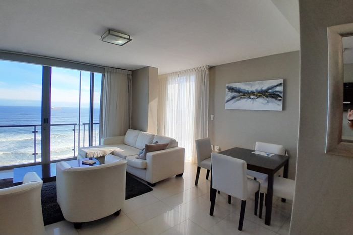 Bloubergstrand Apartment For Sale: Oceanfront living, rental pool, and secure amenities.