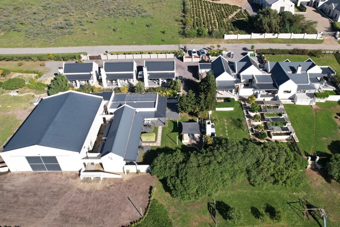 For Sale: Olifantskop Small Holding with 9 bedrooms, guest units, and expansive grounds.