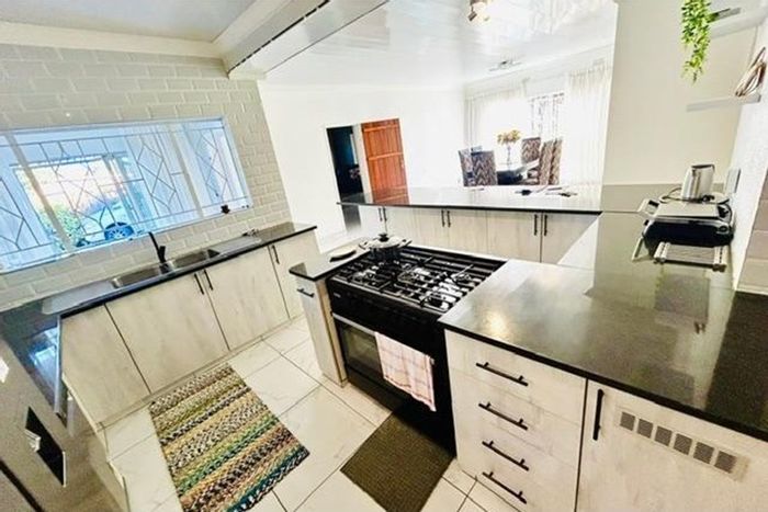 For Sale: Spacious 6-Bedroom House in Mayfield Park with Pool and Cottage.