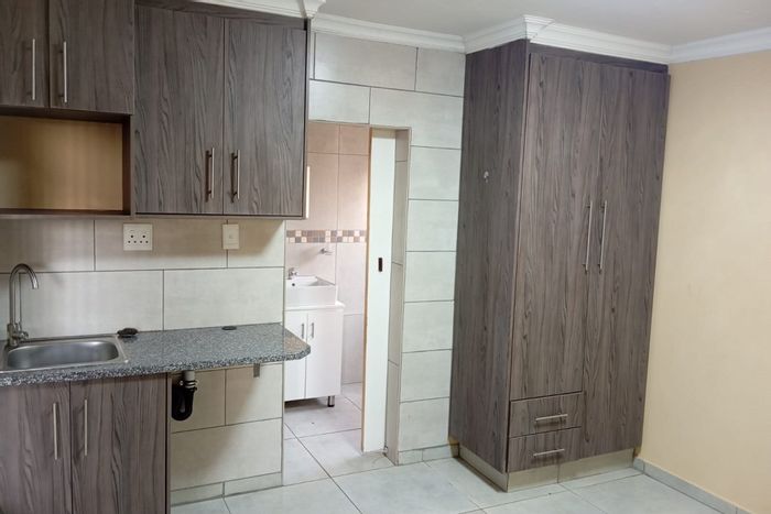Bachelor Apartment To Rent in Etwatwa with secure access and convenient amenities.