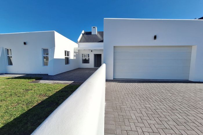 For Sale: House in Lampiesbaai with dual braais, gourmet kitchen, and beach access.