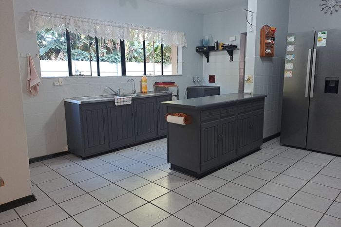 For Sale: Spacious 4-Bedroom House in Amsterdamhoek with Pool and Double Garages.