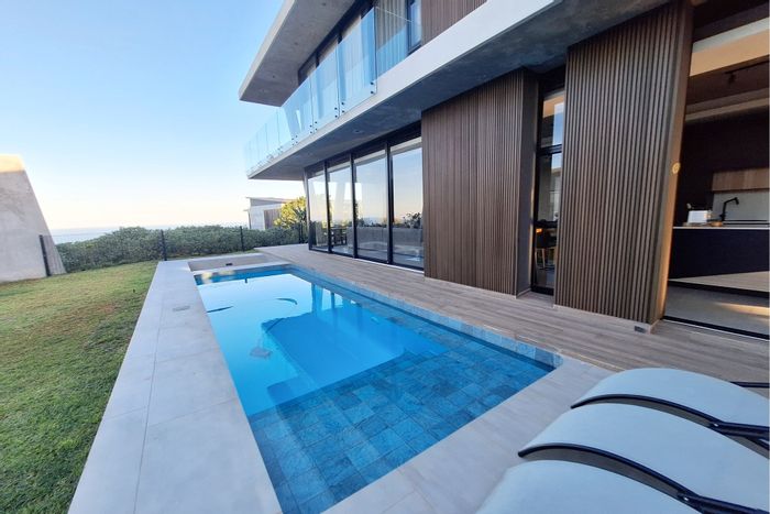 For Sale: House in Zululami Luxury Coastal Estate with pool, clubhouse, and beach access.