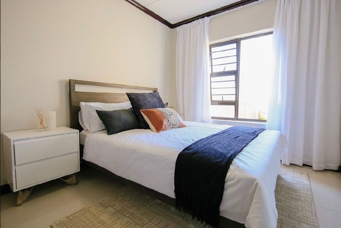 1-Bedroom Apartment To Rent in Blue Hills with Pool, Security, and Garden Access.