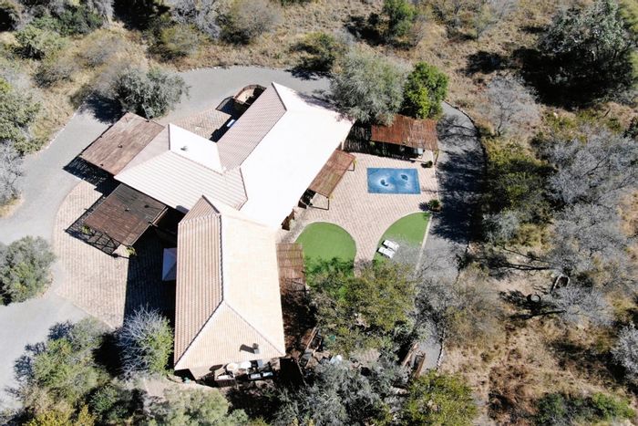 For Sale: House in Shona Langa with game reserve access, pool, and entertainment areas.