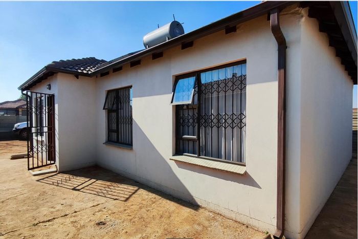 House For Sale in Benoni AH: 3 Bedrooms, secure yard, open-plan living, development potential.