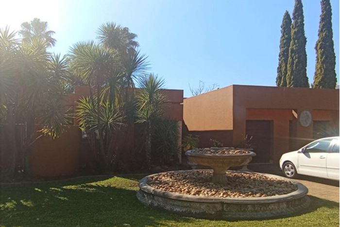 For Sale: House in Silver Lakes Golf Estate with pool, garage, and landscaped garden.