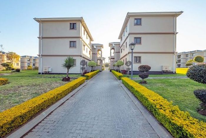 2-Bedroom Townhouse To Rent in Halfway Gardens with pool, parking, and amenities.