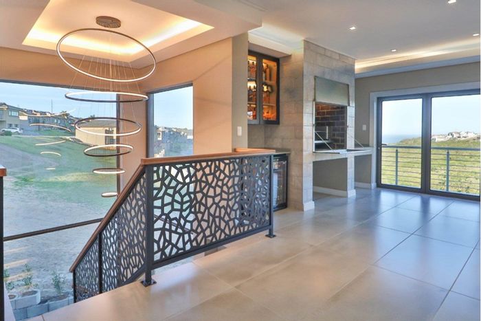 For Sale: House in Seemeeu Park with ocean views, double garage, and outdoor living.