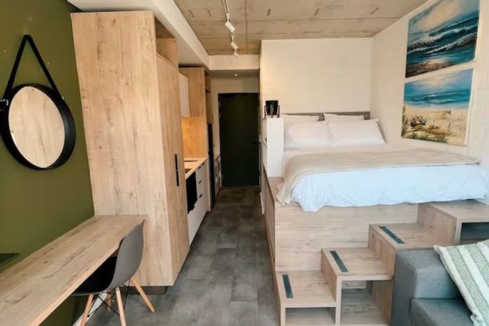 Sea Point Apartment For Sale: Rooftop pool, gym, Airbnb-friendly, steps from Promenade.