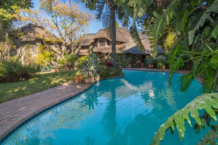 Rivonia House For Sale: Koi pond, pool, flatlet, borehole, secure area.