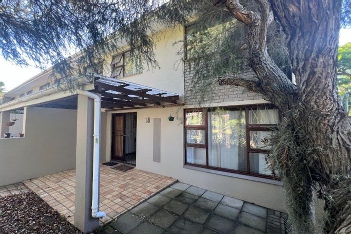 For Sale: 3-Bedroom Townhouse in Beacon Bay with patio, garage, and amenities nearby.