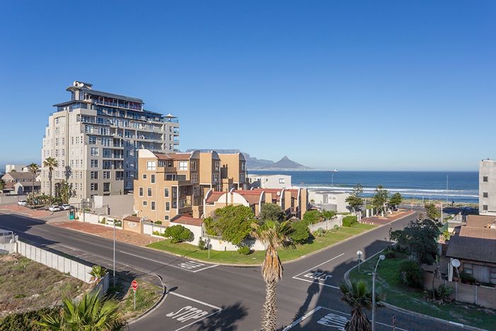 2-Bedroom Apartment To Rent in Bloubergstrand with Sea Views and Parking.