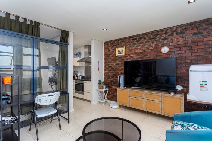 Cape Town City Centre Apartment For Sale: 1-Bedroom, AirBnb-friendly, parking included.
