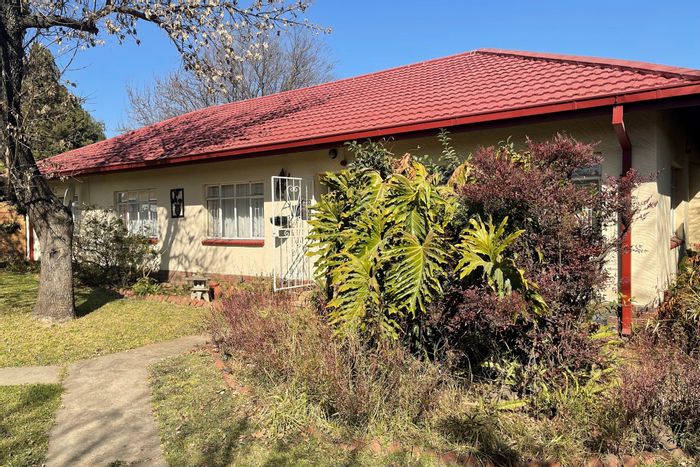 For Sale: Spacious 4-bedroom house in Kriel Central with ample parking and income potential.