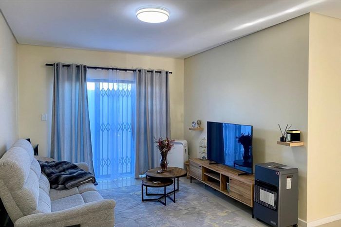 For Sale: 2-Bedroom Apartment in Wetton with Courtyard and Parking Bay.
