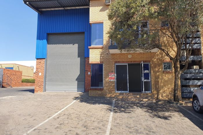 Industrial warehouse to rent in North Riding with office space and parking.