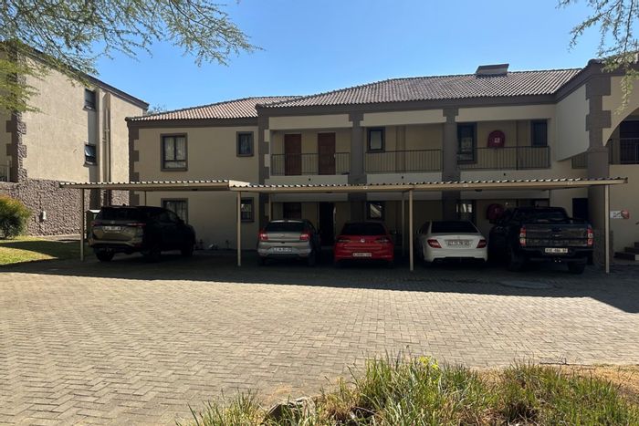 For Sale: Apartment in Stonehenge Ext 8 with 2 beds, patio, and parking.