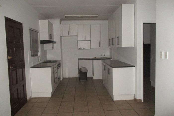 2-Bedroom Apartment For Sale in Kempton Park Central with parking, near amenities.