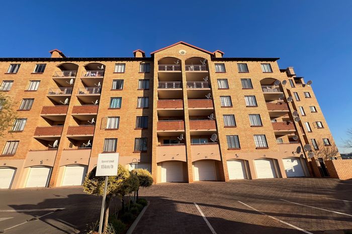 2-Bedroom Apartment To Rent in Die Hoewes with balcony, braai area, and amenities nearby.