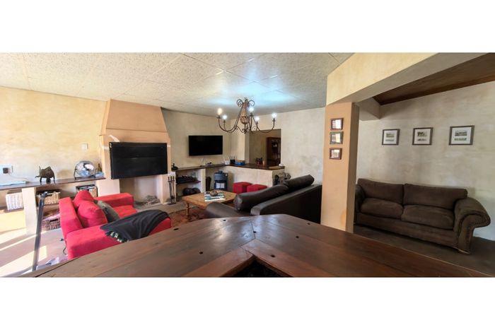 Beaconsfield House For Sale: 4 bedrooms, entertainment room, ample parking, and outbuilding.