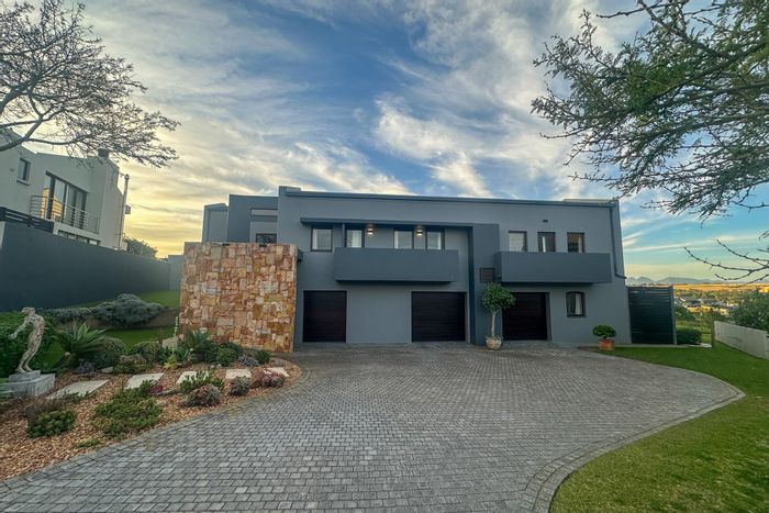 Oubaai House For Sale: 5 beds, pool, tennis court, garage, eco-friendly features.