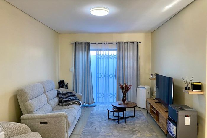 For Sale: 2-Bedroom Apartment in Wetton with Courtyard and Parking Bay.
