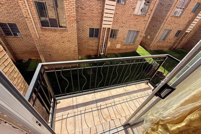 For Sale: 2BR Apartment in Greenhills with balcony, parking, and communal garden.