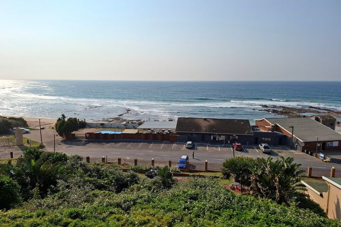 Coastal apartment for sale in Shelly Beach with pool, garden, and parking.