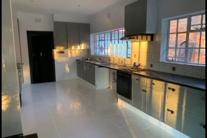 3-Bedroom House to Rent in Lombardy East with yard, electric gate, and parking.