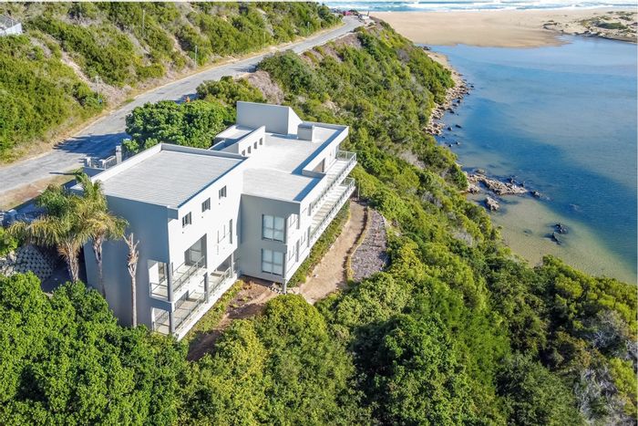 For Sale: Kingfisher Creek House with 5 bedrooms, sea views, and ample parking.
