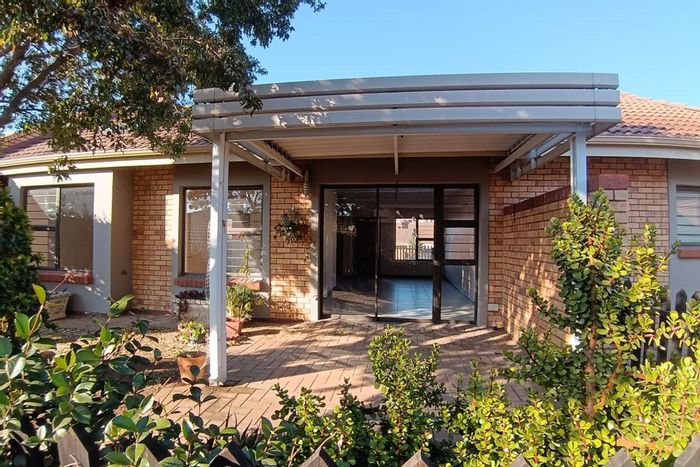 For Sale: 2-Bedroom Townhouse in Olivedale with courtyard, garage, and retirement amenities.