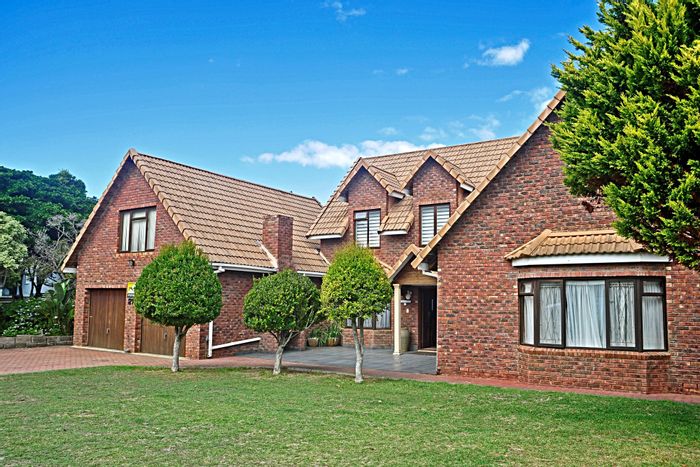 Hersham House For Sale: Beach access, dual garage, and versatile loft space.