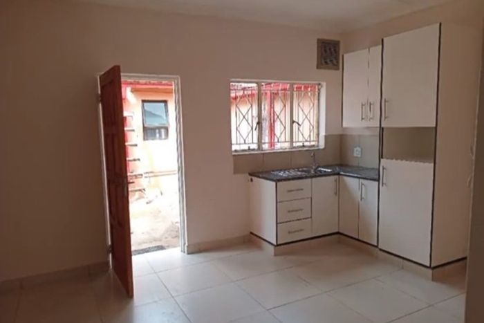 2-Bedroom House to Rent in Lombardy East with secure parking and electric gate.