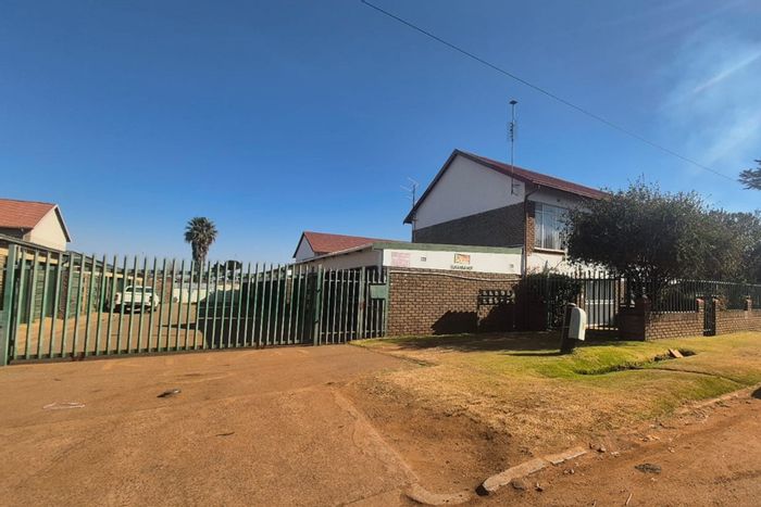 2-Bedroom Apartment For Sale in Randfontein Central with Private Garden and Garage.
