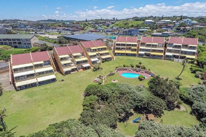 For Sale: 4-bedroom apartment in Shelly Beach with pool, balcony, and parking.