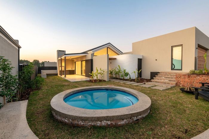 For Sale: House in Elaleni Coastal Forest Estate with pool, clubhouse, and solar features.