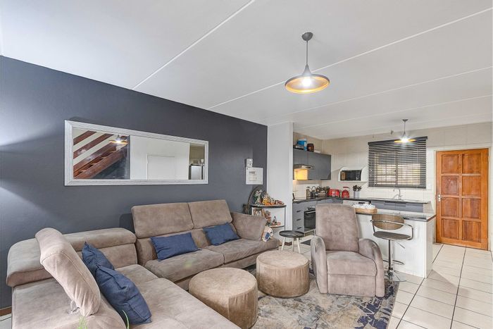For Sale: 2-Bedroom Townhouse in Sonneglans with patio, balcony, and covered parking.