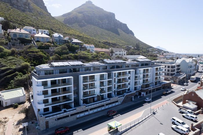 1-Bedroom Apartment To Rent in Muizenberg Central with parking, balcony, and security features.