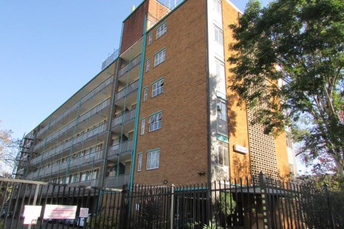 For Sale: 2-Bedroom Apartment in Wonderboom South with Garage and Rental Income.