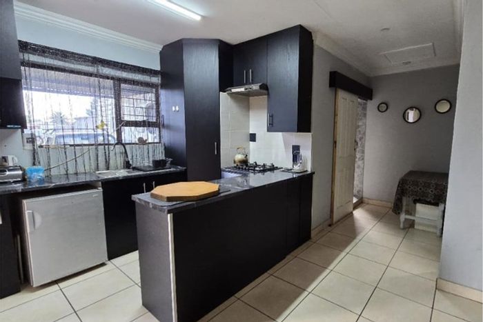 Rothdene House For Sale: Two homes, spacious yard, secure parking, rental potential.