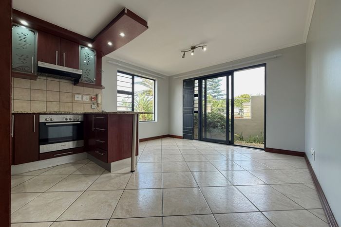 Waves Edge Apartment For Sale: Ground floor, pool access, near beach and amenities.