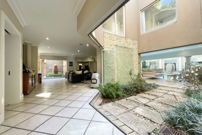 For Sale: Spacious Atholl house with pool, gourmet kitchen, and multiple living areas.