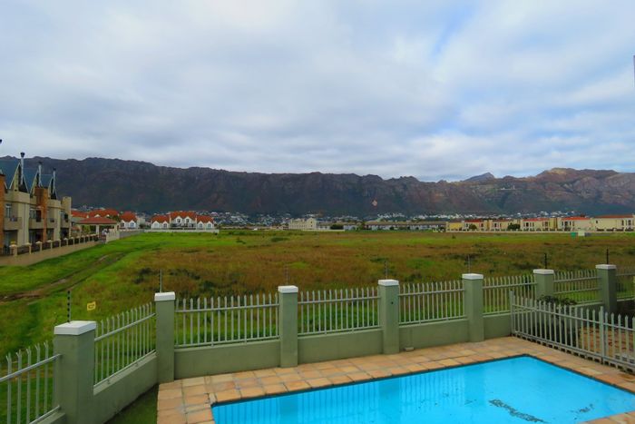 2 Bedroom Apartment To Rent in Gordons Bay Central with Pool, Security, and Parking.