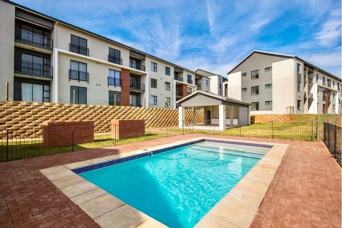 Eco-smart 2-bedroom apartment in Hayfields with security, trails, and amenities. For Sale.