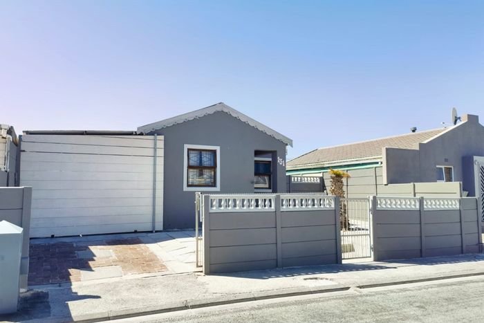 House To Rent in Strandfontein: 3 Bedrooms, large backyard, secure parking, near amenities.
