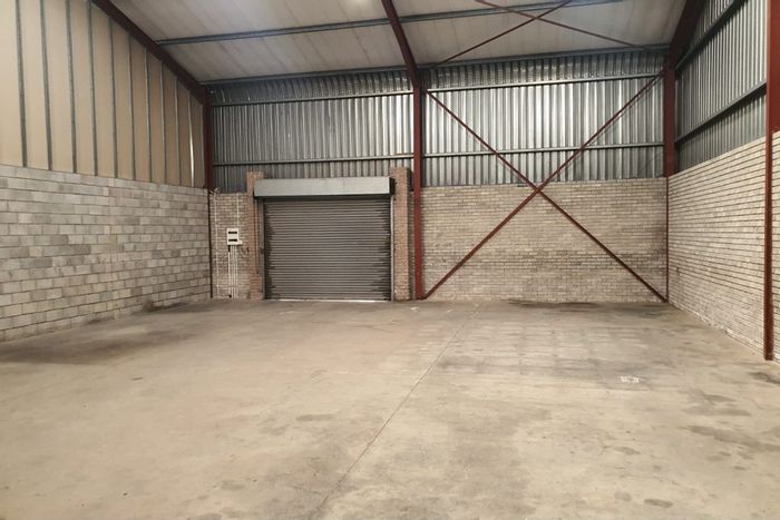 For Sale: Industrial warehouse in Greenbushes with security, mezzanine office, and loading access.