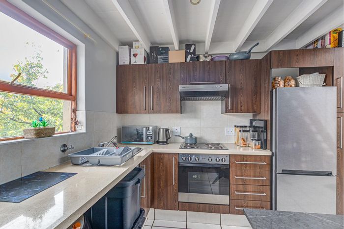 Broadacres Apartment For Sale: 1-bed loft, balcony, pool, security, clubhouse amenities.