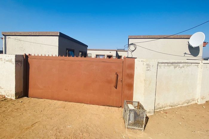 For Sale: Apartment in Caleb Motsoabi with three tenanted units, prepaid electricity.